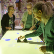 residents enjoying interactive sensory games and activities