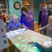care home residents using interactive sensory table