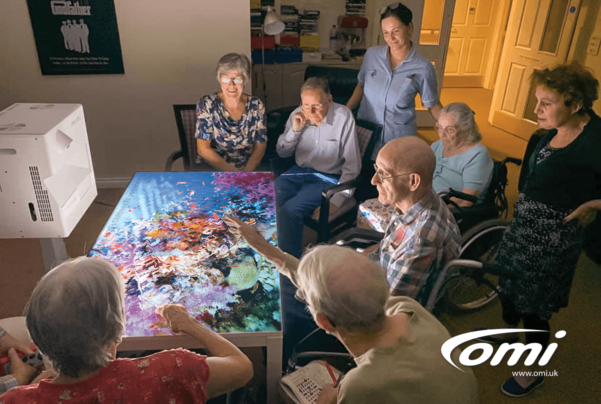 care home residents using a mobii magic table rpojector