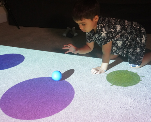 School Children interacting with Sensory Room interactive floor and wall projections