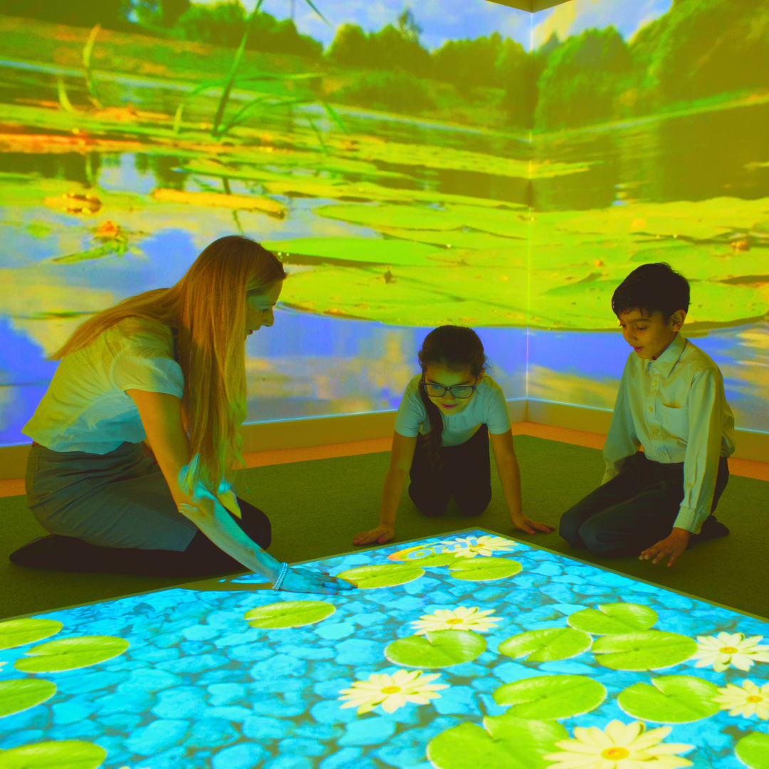 omiRoom Tile School Children interacting with Sensory Room interactive floor and wall projections